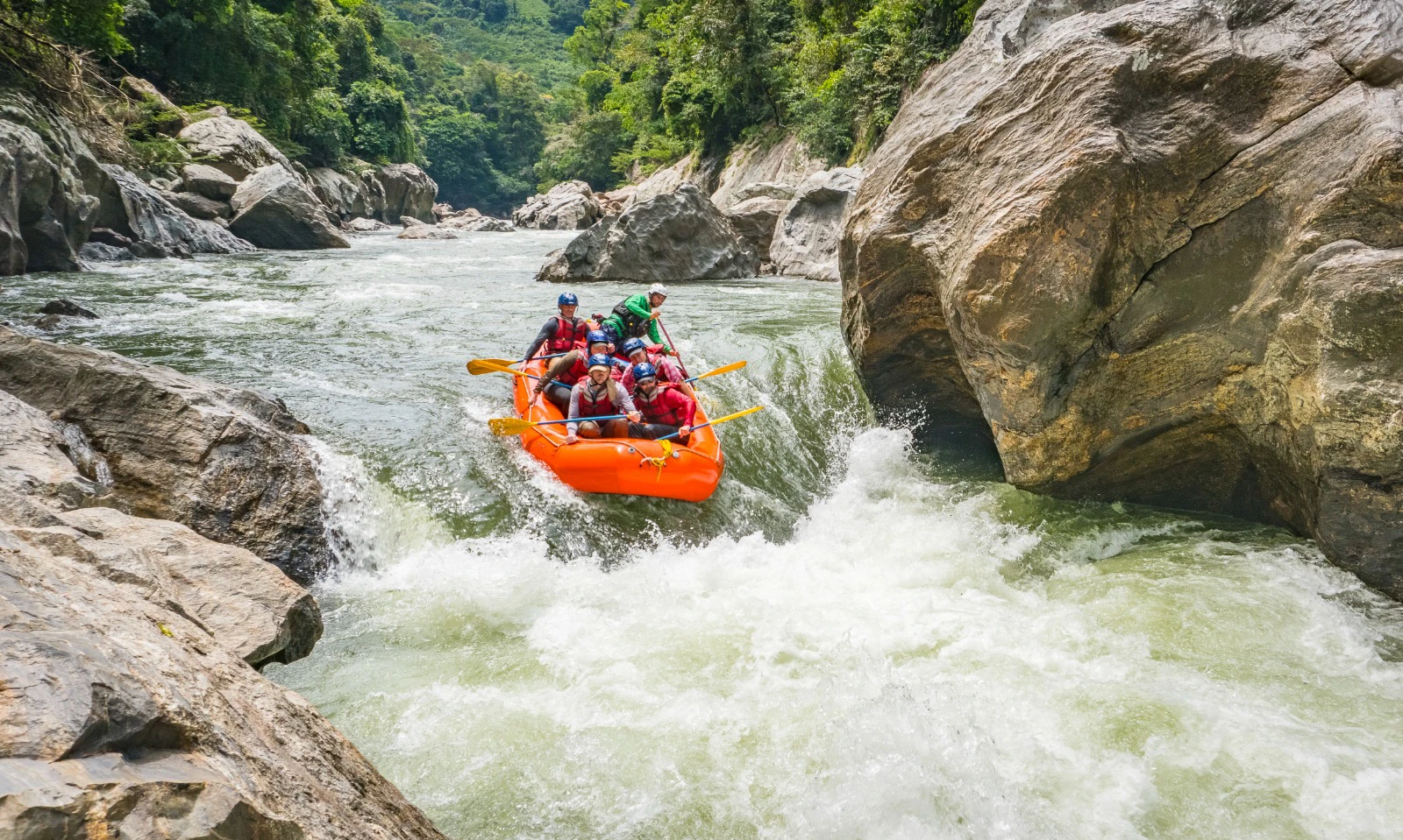 Descending a Class III-IV rapid on the Río Samaná.